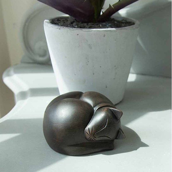 Sleeping cat urn